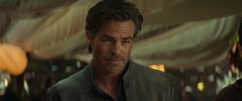 Movie still from “Dungeons & Dragons: Honor Among Thieves” (2023), directed by John Francis Daley – A person wearing a jacket; Close Up shot, Over the shoulder angle