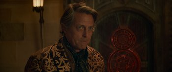 Movie still from “Dungeons & Dragons: Honor Among Thieves” (2023), directed by John Francis Daley – A person wearing a jacket; Close Up shot, Over the shoulder angle