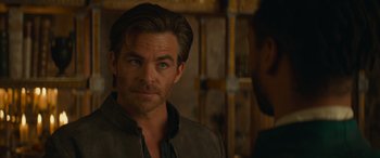 Movie still from “Dungeons & Dragons: Honor Among Thieves” (2023), directed by John Francis Daley – A person wearing a jacket; Close Up shot, Over the shoulder angle