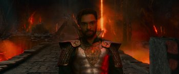 Movie still from “Dungeons & Dragons: Honor Among Thieves” (2023), directed by John Francis Daley – A man wearing a metal armor and a helmet; Medium shot, High angle