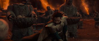 Movie still from “Dungeons & Dragons: Honor Among Thieves” (2023), directed by John Francis Daley – A man that is dressed in armor; Medium shot, High angle