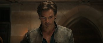 Movie still from “Dungeons & Dragons: Honor Among Thieves” (2023), directed by John Francis Daley – A person wearing a jacket; Close Up shot, Over the shoulder angle