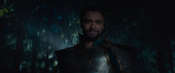 Movie still from “Dungeons & Dragons: Honor Among Thieves” (2023), directed by John Francis Daley – A person wearing armor; Close Up shot, Over the shoulder angle