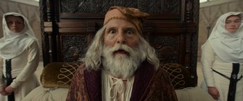 Movie still from “Dungeons & Dragons: Honor Among Thieves” (2023), directed by John Francis Daley – An old man with long white hair and a beard; Close Up shot, Low angle
