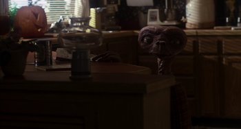 Movie still from “E.T. the Extra-Terrestrial” (1982), directed by Steven Spielberg – An image of an e; Medium shot, High angle
