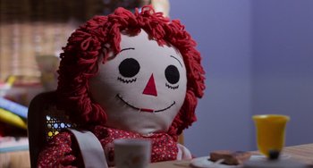 Movie still from “E.T. the Extra-Terrestrial” (1982), directed by Steven Spielberg – The face of a raggedy ann doll; Close Up shot, High angle