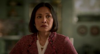 Movie still from “Easter Sunday” (2022), directed by Jay Chandrasekhar – A person wearing a jacket; Close Up shot, Over the shoulder angle