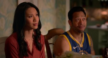 Movie still from “Easter Sunday” (2022), directed by Jay Chandrasekhar – A man and a woman sitting at a dining table; Close Up shot, Over the shoulder angle