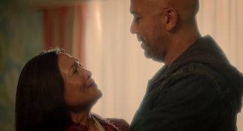 Movie still from “Easter Sunday” (2022), directed by Jay Chandrasekhar – A man and a woman looking at one another; Close Up shot, Over the shoulder angle