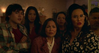 Movie still from “Easter Sunday” (2022), directed by Jay Chandrasekhar – A group of women standing next to each other in a room; Medium shot, High angle