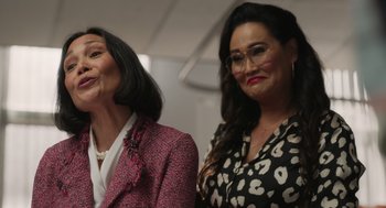 Movie still from “Easter Sunday” (2022), directed by Jay Chandrasekhar – A couple of women standing next to each other; Medium shot, Low angle