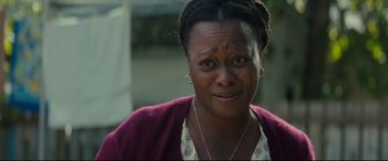 Movie still from “A Dog's Journey” (2019), directed by Gail Mancuso – A person wearing a sweater; Close Up shot, Over the shoulder angle