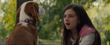 Movie still from “A Dog's Journey” (2019), directed by Gail Mancuso – A girl and a dog looking at each other; Close Up shot, Over the shoulder angle