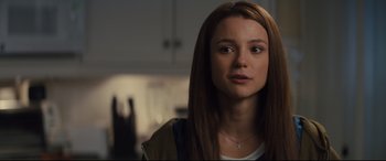 Movie still from “A Dog's Journey” (2019), directed by Gail Mancuso – A woman with long brown hair stares into the camera; Close Up shot, Over the shoulder angle