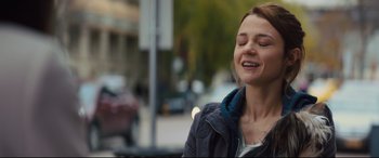 Movie still from “A Dog's Journey” (2019), directed by Gail Mancuso – A beautiful young lady standing next to a street; Close Up shot, Over the shoulder angle