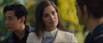 Movie still from “A Dog's Journey” (2019), directed by Gail Mancuso – A beautiful young lady wearing a white jacket; Close Up shot, Over the shoulder angle