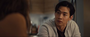 Movie still from “A Dog's Journey” (2019), directed by Gail Mancuso – A young man is sitting in front of the camera; Close Up shot, Over the shoulder angle