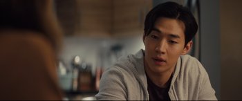 Movie still from “A Dog's Journey” (2019), directed by Gail Mancuso – A young man sitting in front of a mirror; Close Up shot, Over the shoulder angle