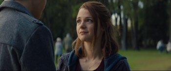 Movie still from “A Dog's Journey” (2019), directed by Gail Mancuso – A woman with long red hair is looking up; Close Up shot, Over the shoulder angle