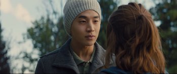 Movie still from “A Dog's Journey” (2019), directed by Gail Mancuso – A young man wearing a hat and a jacket; Close Up shot, Over the shoulder angle