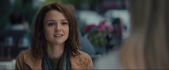 Movie still from “A Dog's Journey” (2019), directed by Gail Mancuso – A young woman with brown hair wearing a brown jacket; Close Up shot, Over the shoulder angle