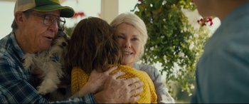 Movie still from “A Dog's Journey” (2019), directed by Gail Mancuso – An older woman is hugging a younger woman; Close Up shot, Over the shoulder angle