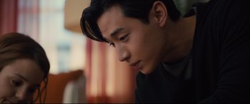 Movie still from “A Dog's Journey” (2019), directed by Gail Mancuso – A person looking down at his face; Close Up shot, Over the shoulder angle