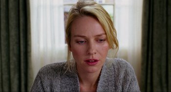 Movie still from “Eastern Promises” (2007), directed by David Cronenberg – A person wearing a sweater; Close Up shot, Over the shoulder angle