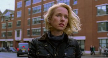 Movie still from “Eastern Promises” (2007), directed by David Cronenberg – A woman with blonde hair wearing a black jacket; Close Up shot, Low angle