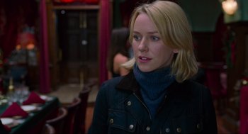 Movie still from “Eastern Promises” (2007), directed by David Cronenberg – A woman with blonde hair wearing a black jacket; Close Up shot, Over the shoulder angle