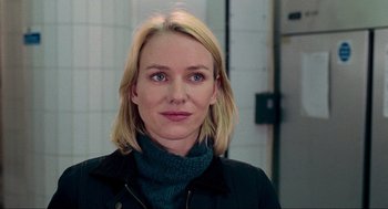 Movie still from “Eastern Promises” (2007), directed by David Cronenberg – A person wearing a jacket; Close Up shot, Over the shoulder angle