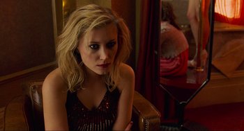 Movie still from “Eastern Promises” (2007), directed by David Cronenberg – A woman sitting in front of a mirror in front of a mirror; Close Up shot, Over the shoulder angle