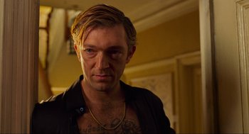 Movie still from “Eastern Promises” (2007), directed by David Cronenberg – A person with a tattoo on his chest; Close Up shot, Over the shoulder angle