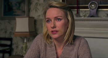 Movie still from “Eastern Promises” (2007), directed by David Cronenberg – A person wearing a sweater; Close Up shot, Over the shoulder angle