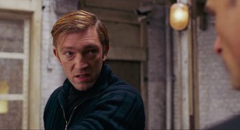 Movie still from “Eastern Promises” (2007), directed by David Cronenberg – A person wearing a jacket; Close Up shot, Over the shoulder angle