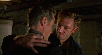 Movie still from “Eastern Promises” (2007), directed by David Cronenberg – A man and a man in a black shirt; Close Up shot, Over the shoulder angle