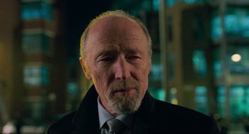 Movie still from “Eastern Promises” (2007), directed by David Cronenberg – An older man wearing a suit and a tie; Close Up shot, Low angle