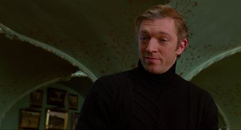 Movie still from “Eastern Promises” (2007), directed by David Cronenberg – A person wearing a sweater; Close Up shot, Low angle