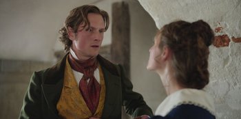 Movie still from “Ehrengard: The Art of Seduction” (2023), directed by Bille August – A man and a woman are talking to each other; Close Up shot, Over the shoulder angle