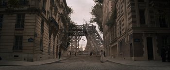 Movie still from “Eiffel” (2021), directed by Martin Bourboulon – An image of an eiffel tower being built in paris; Extreme Wide shot, Low angle