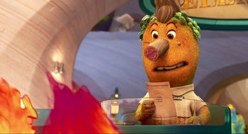 Movie still from “Elemental” (2023), directed by Peter Sohn – An orange with a face on it is sitting in front of a table; Close Up shot, Over the shoulder angle