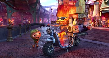 Movie still from “Elemental” (2023), directed by Peter Sohn – An animated scene of a boy and a motorcycle with flames coming out of it; Wide shot, Over the shoulder angle