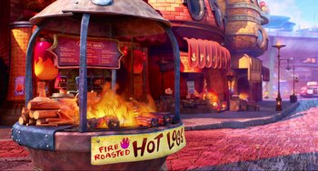 Movie still from “Elemental” (2023), directed by Peter Sohn – A fire roasted hot log in front of a restaurant; Extreme Wide shot, High angle