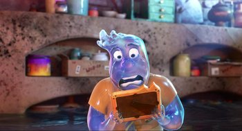 Movie still from “Elemental” (2023), directed by Peter Sohn – A plastic character holding an object in his hands; Close Up shot, Over the shoulder angle