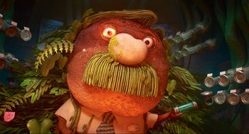 Movie still from “Elemental” (2023), directed by Peter Sohn – The face of a statue of a man with a beard; Medium shot, Low angle