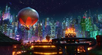 Movie still from “Elemental” (2023), directed by Peter Sohn – An image of a hot air balloon flying over a city at night; Extreme Wide shot, Low angle