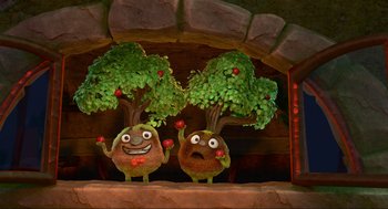 Movie still from “Elemental” (2023), directed by Peter Sohn – A couple of cartoon characters are standing next to each other; Wide shot, Low angle