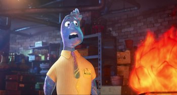 Movie still from “Elemental” (2023), directed by Peter Sohn – An image of an animated character in a restaurant setting; Medium shot, Over the shoulder angle