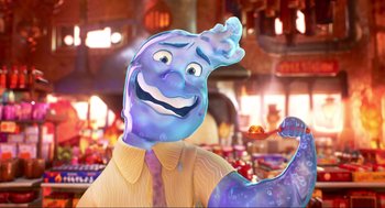 Movie still from “Elemental” (2023), directed by Peter Sohn – A man in a yellow shirt and a blue tie; Close Up shot, Over the shoulder angle