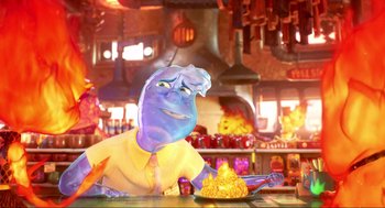 Movie still from “Elemental” (2023), directed by Peter Sohn – An image of an animated character in a kitchen; Medium shot, Over the shoulder angle